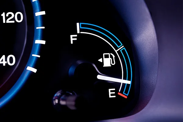 closeup of fuel gauge near empty